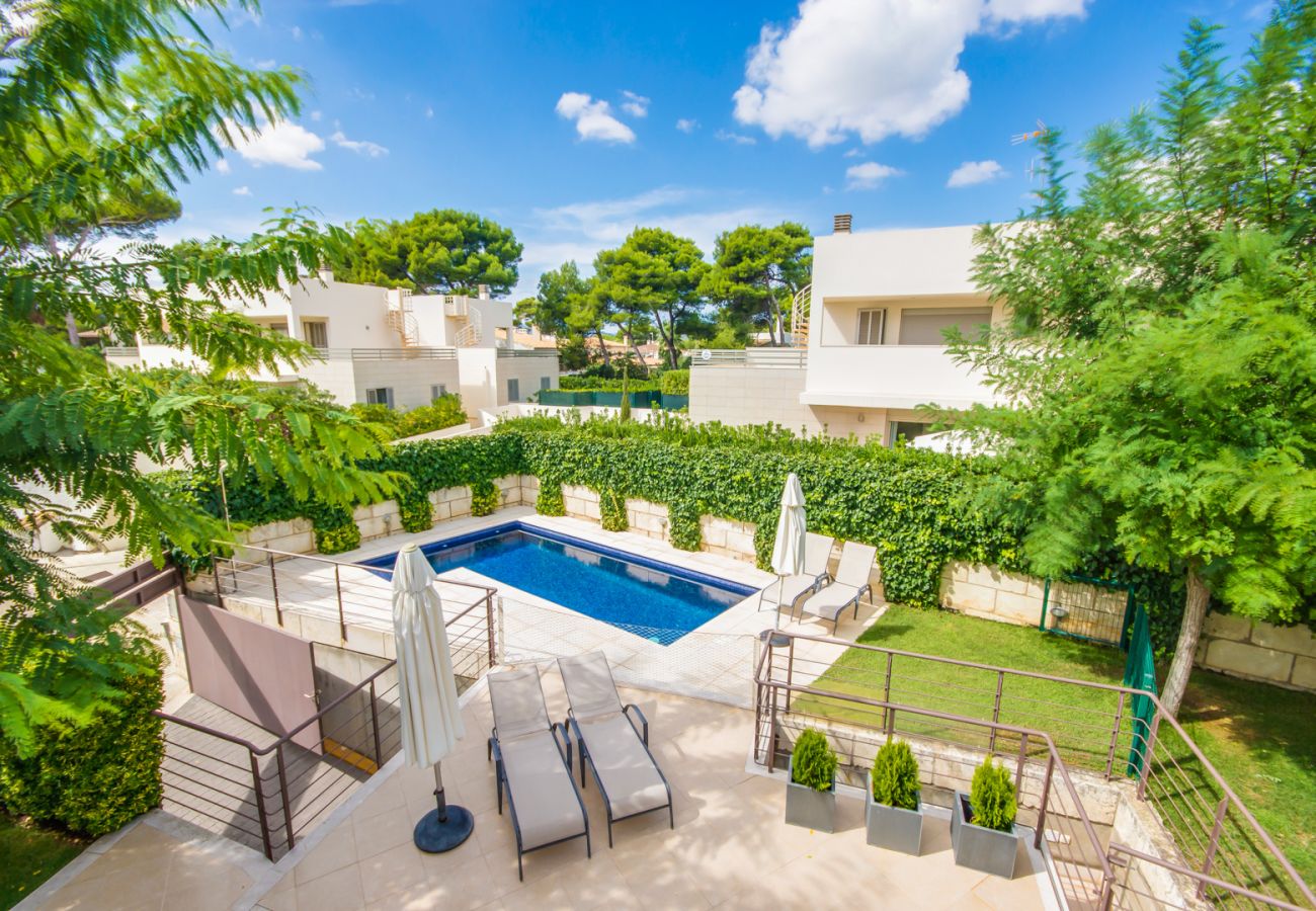 House with pool near the beach.