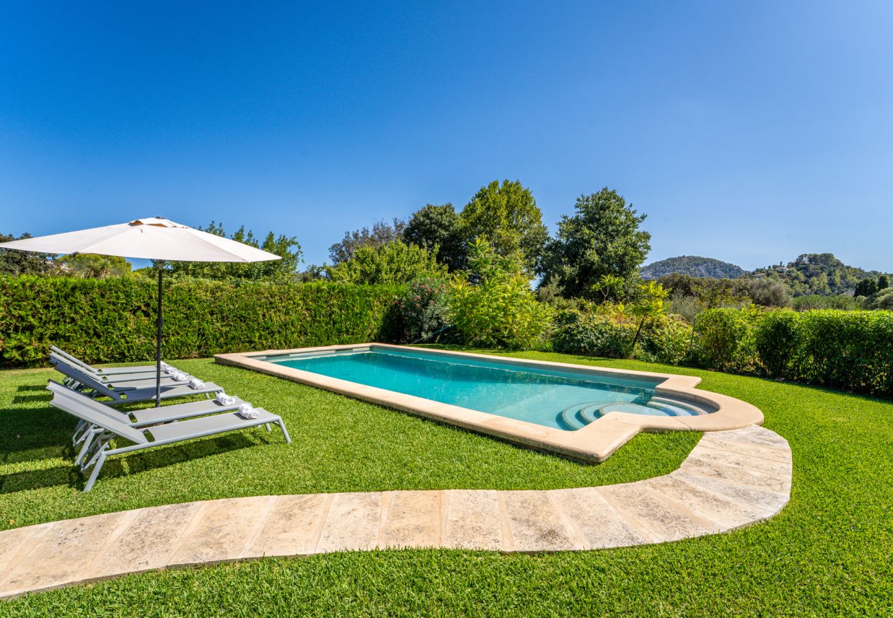 Villa with a pool and garden in Pollensa