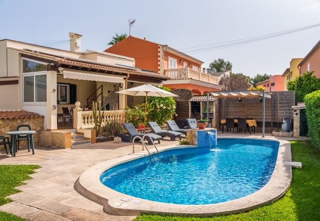 House with pool near the sea.